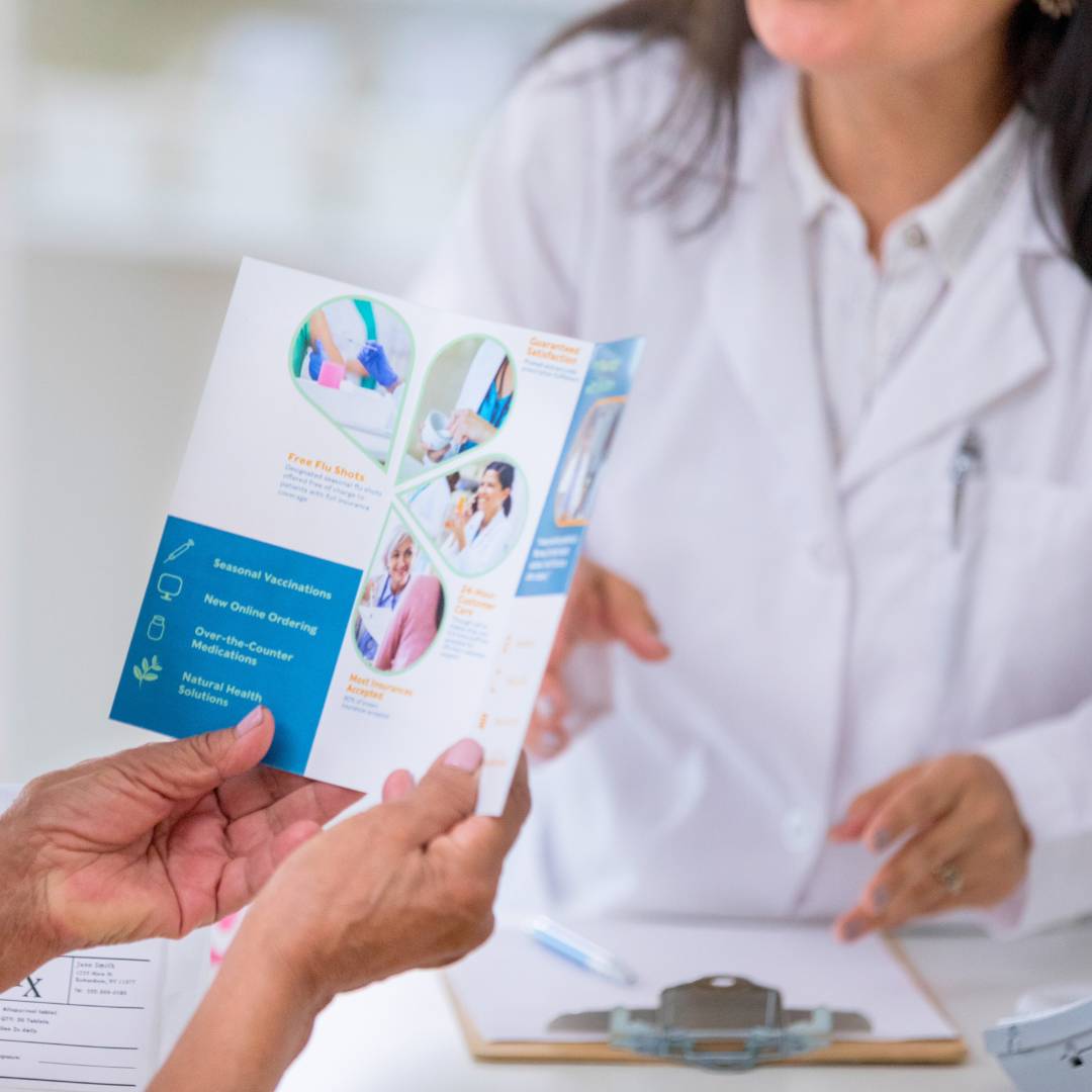 customer reviewing a printed pamphlet