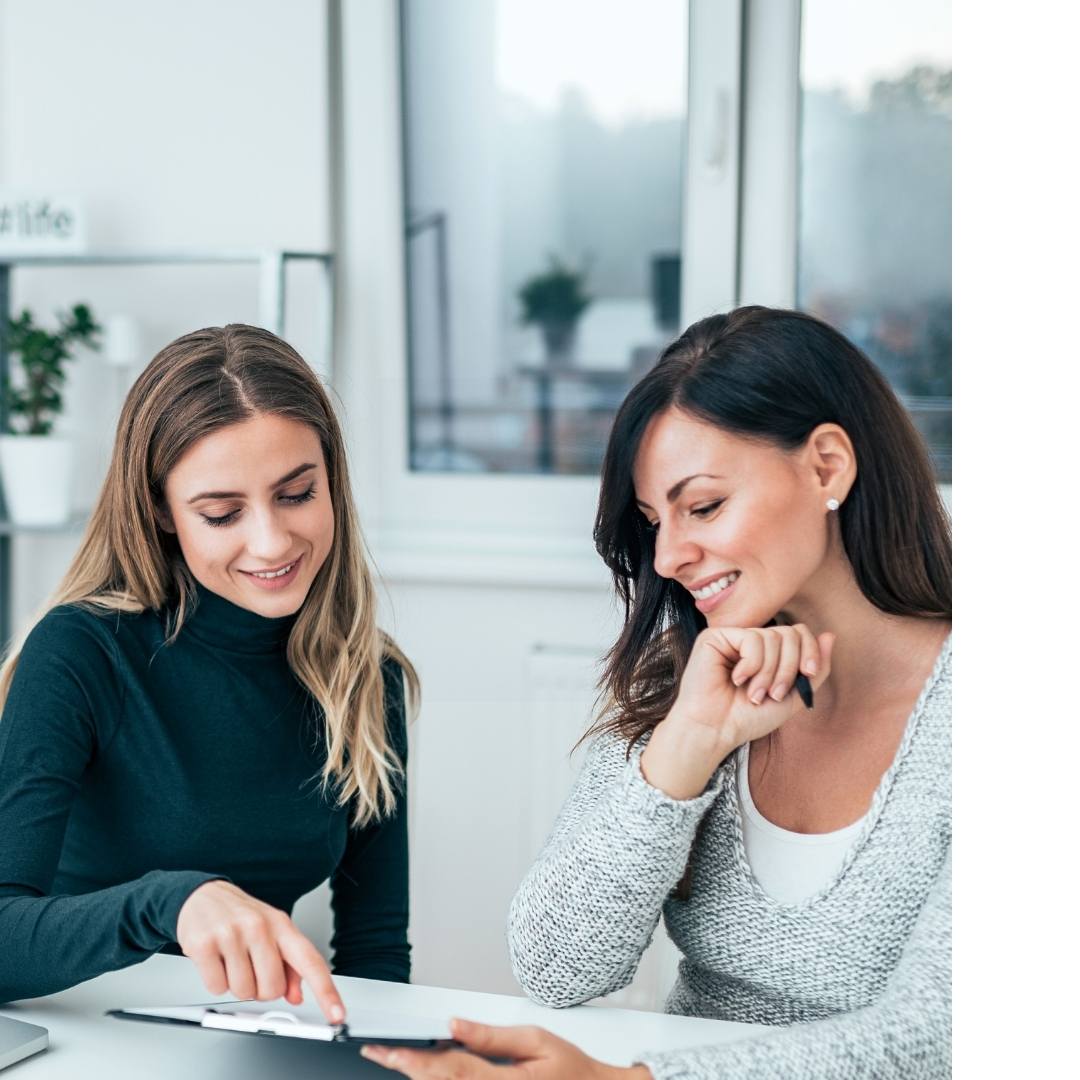 Woman reviewing a document during a marketing consultation