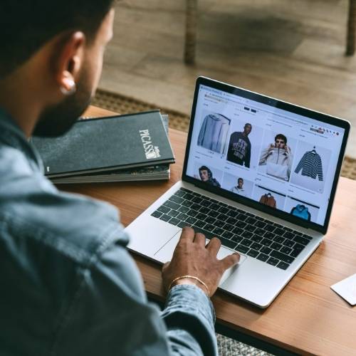 Man shopping on his laptop